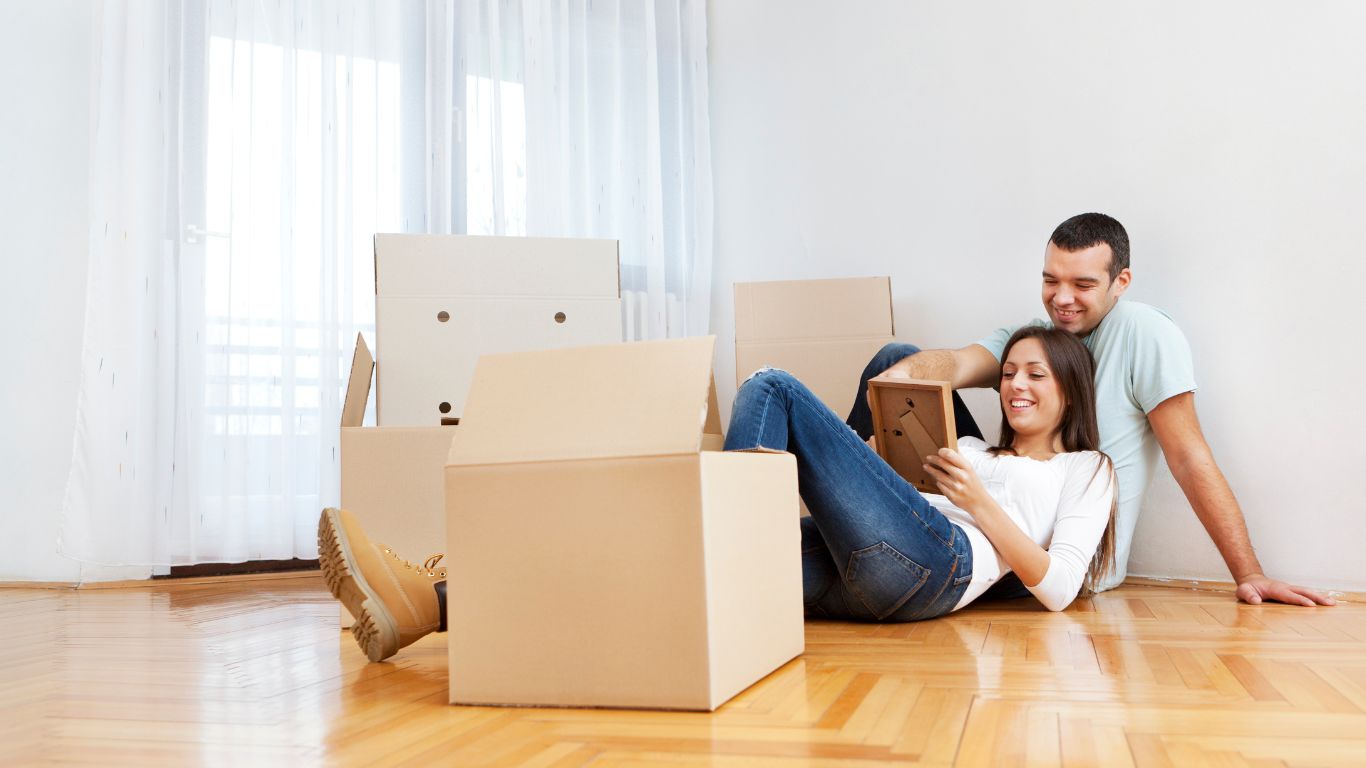 Couple staring at keepsake photograph